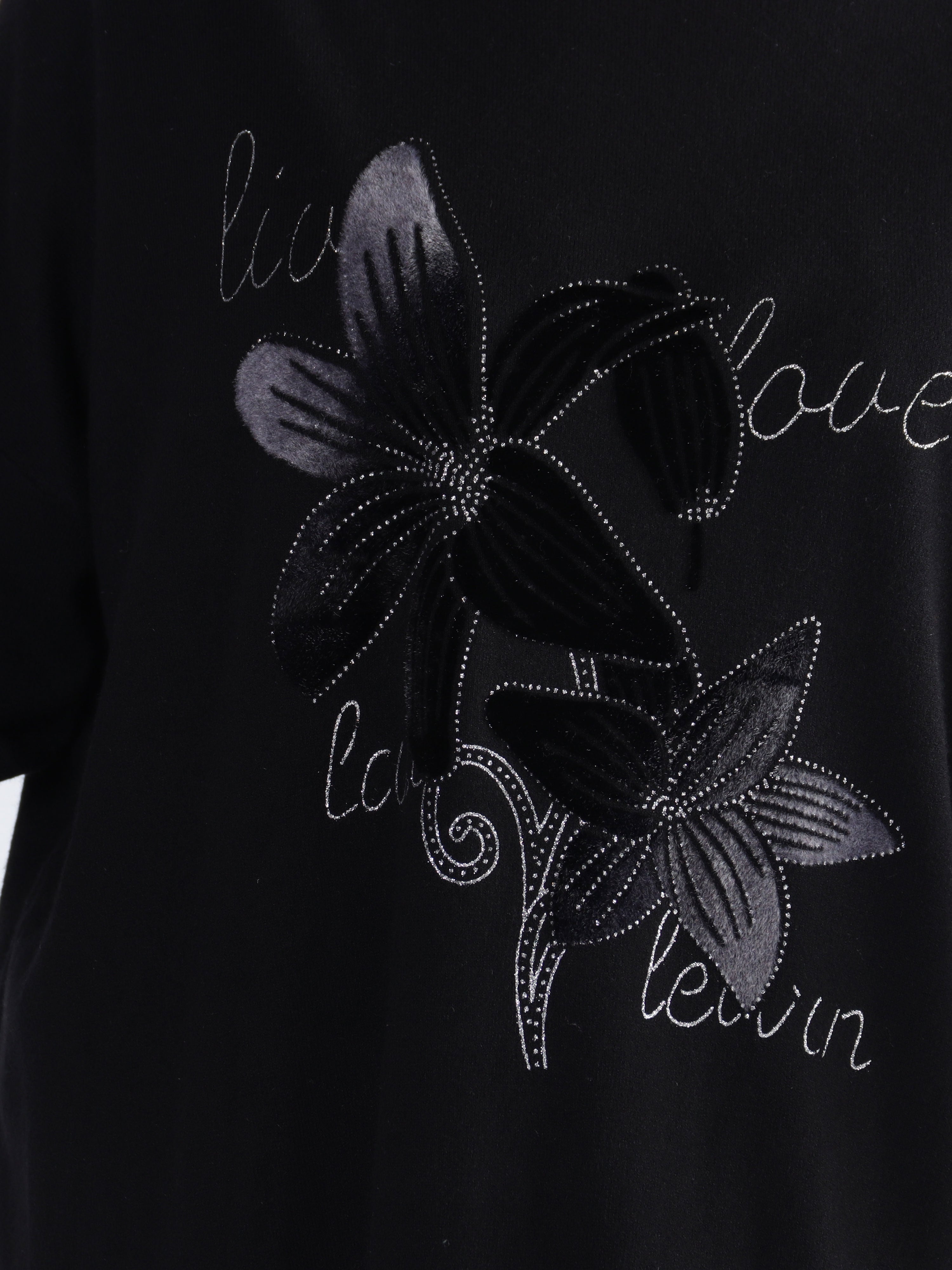 Amilie - Blød plus size strikkjole med blomstermotiver